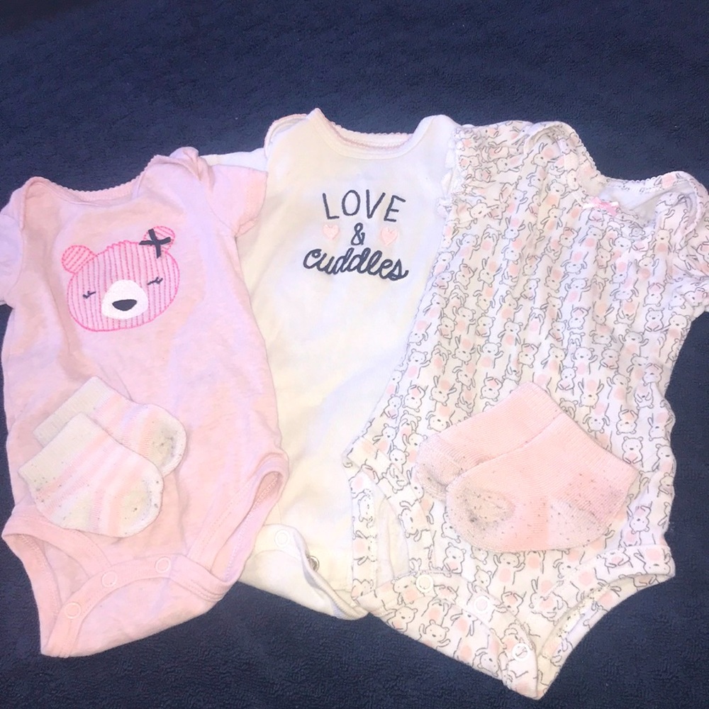 Carter’s Pink onesies and socks